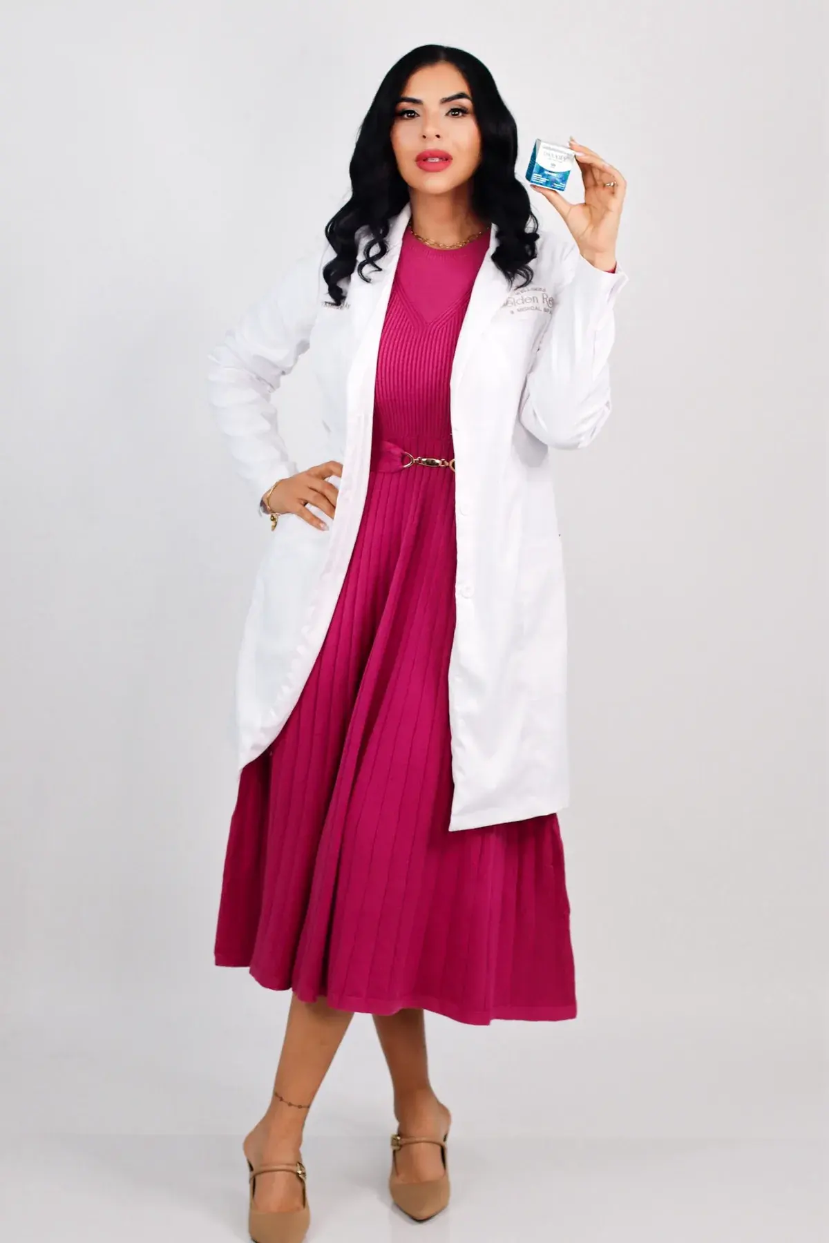 Dr. Kimberly Ayala Vega in her white coat at Golden Rose Wellness & Medical Spa